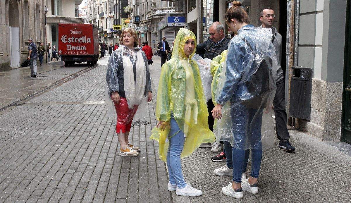 Turistas con chuvasqueiro