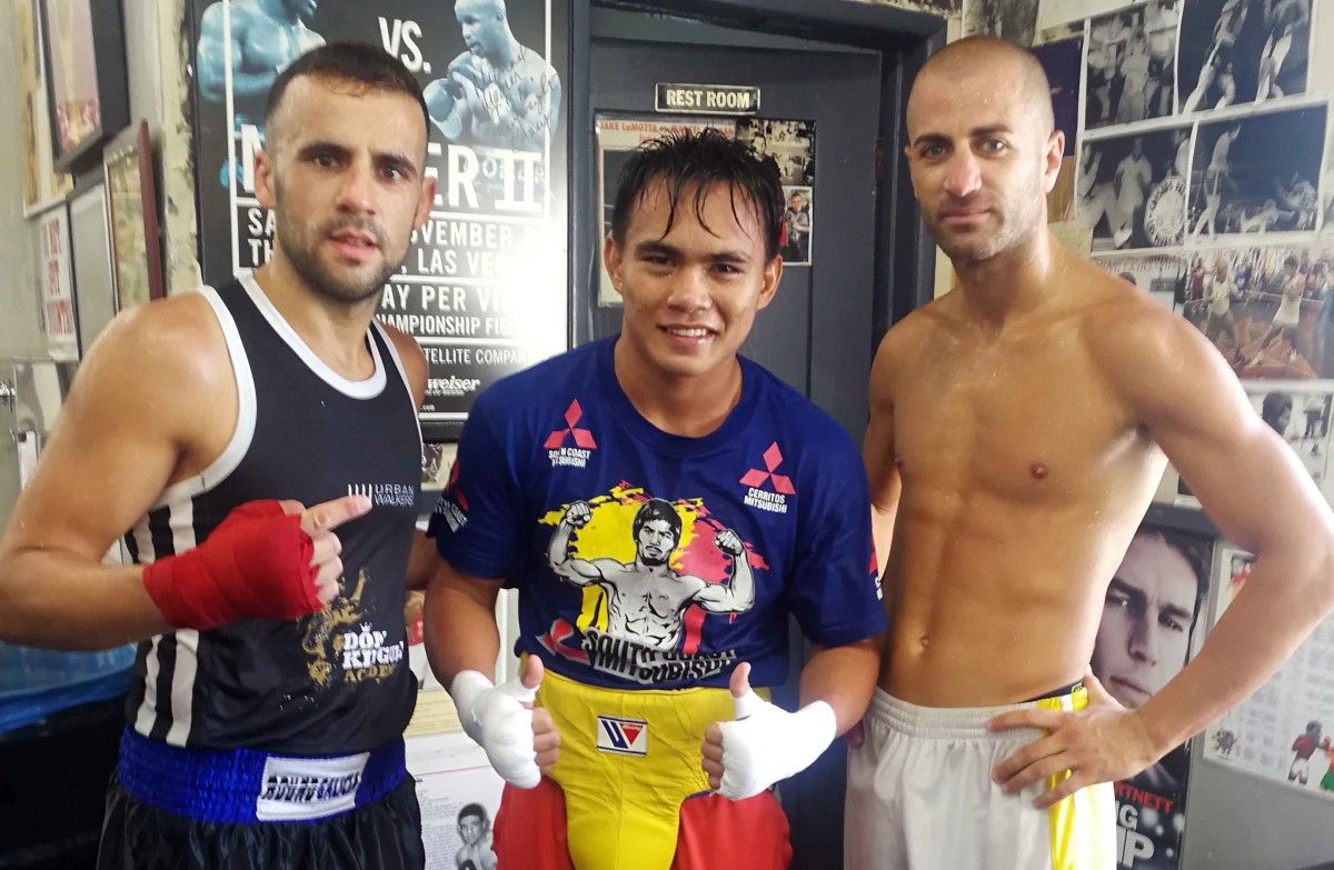 Aarón González con Duno Romero e cun deportista olímpico australiano