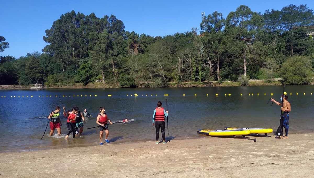 Jornada de limpieza del río en paddle surf