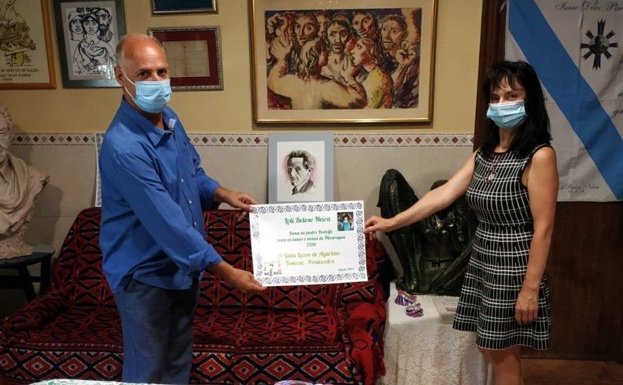 Loli Beloso y Tato Heredia simbolizan la donación para el padre Rodolfo