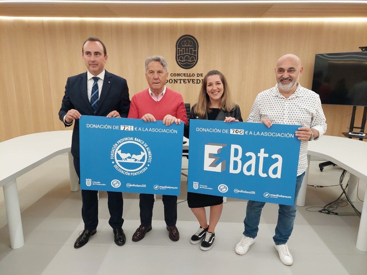Entrega dos cheques solidarios da Gladiator Race a Autismo BATA e ao Banco de Alimentos