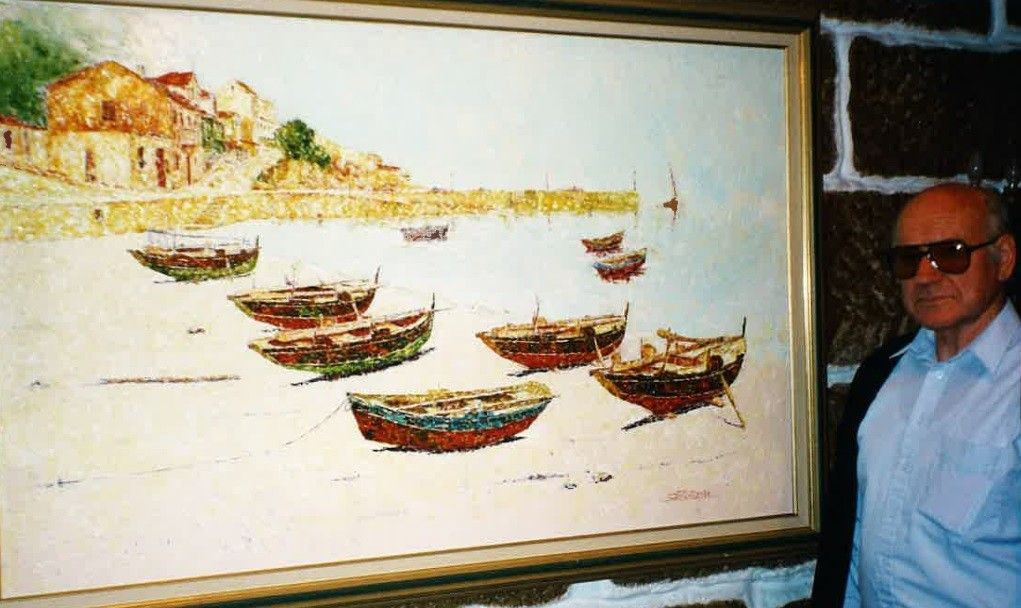José Otero Baena diante dunha das súas pinturas