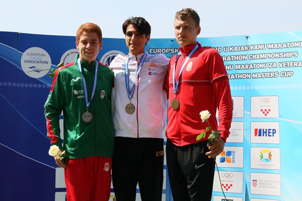 Podio de David Pazos coa medalla de ouro