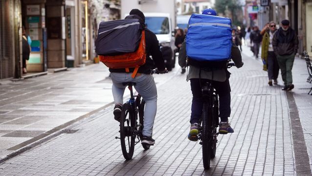 Repartidores en bicicleta