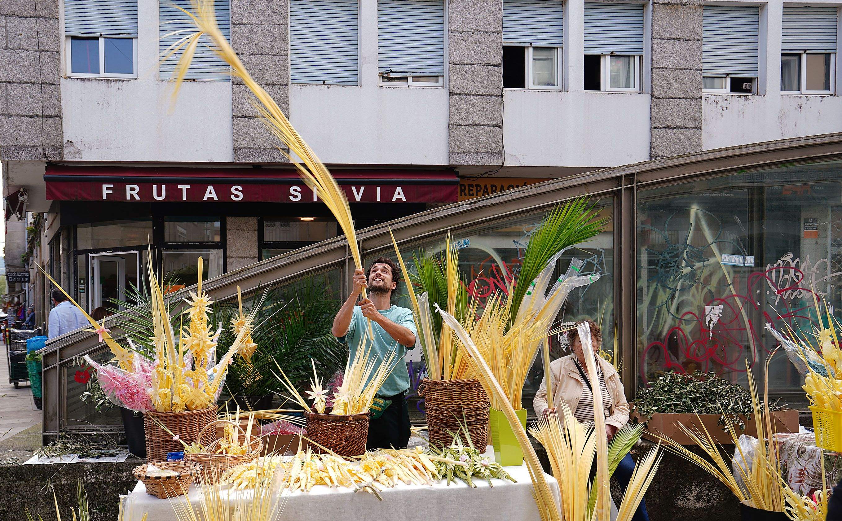 Puestos de venta de palmas frente al Mercado Puestos de venta de palmas frente al Mercado