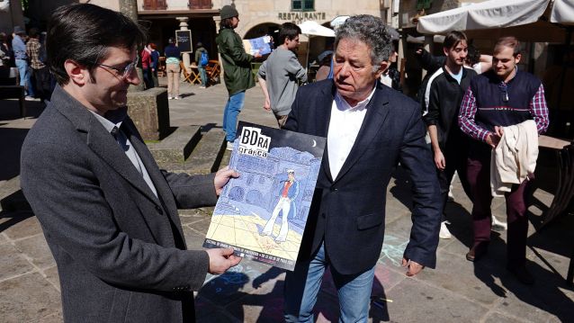 Kiko da Silva e Miguel Anxo Fernández Lores amosan o cartel de BDra Gráfica 2025