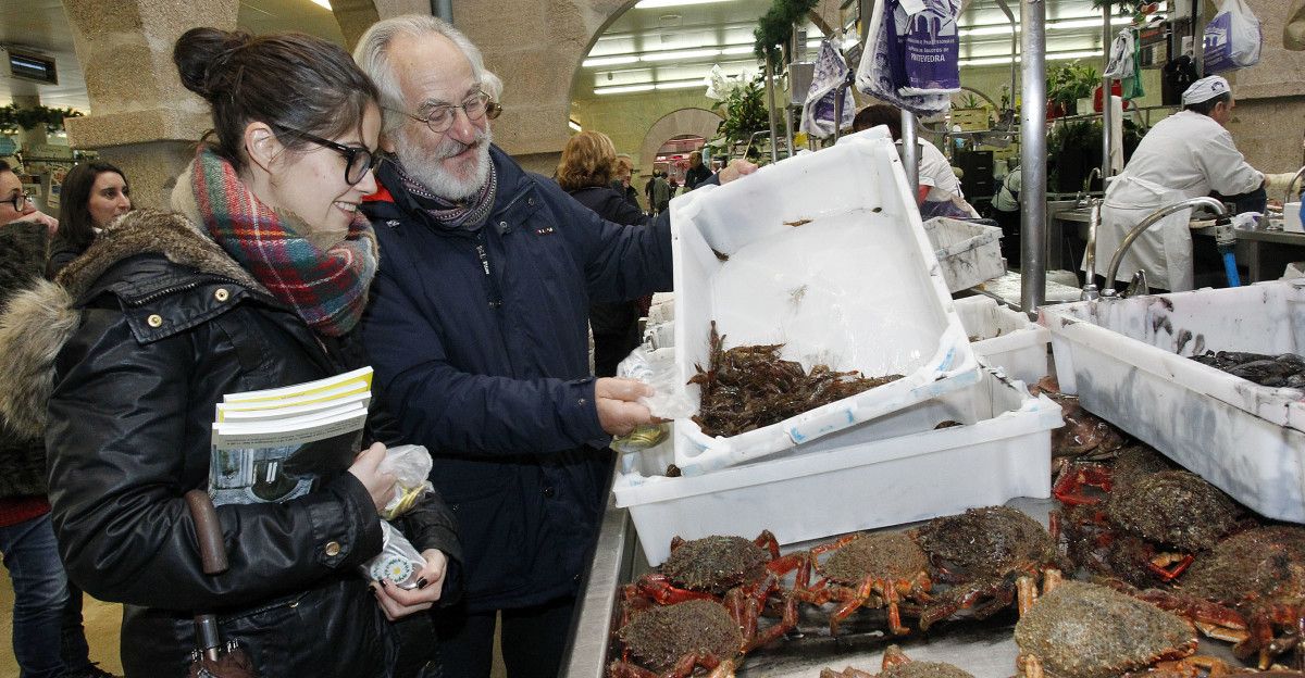 Anabel Gulías e Vicente García Legísima no Mercado de Abastos