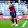 Charly festexa un dos seus goles no partido de liga entre Pontevedra e Coruxo en Pasarón