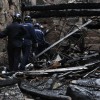 Axentes da Comisaría Xeral da Policía Científica investigan o incendio da Ferrería