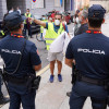 Protesta dos traballadores de ENCE na saída de La Vuelta en Sanxenxo
