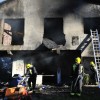Os Bombeiros e a Policía Local sufocan un incendio nunha casa deshabitada en Monte Porreiro